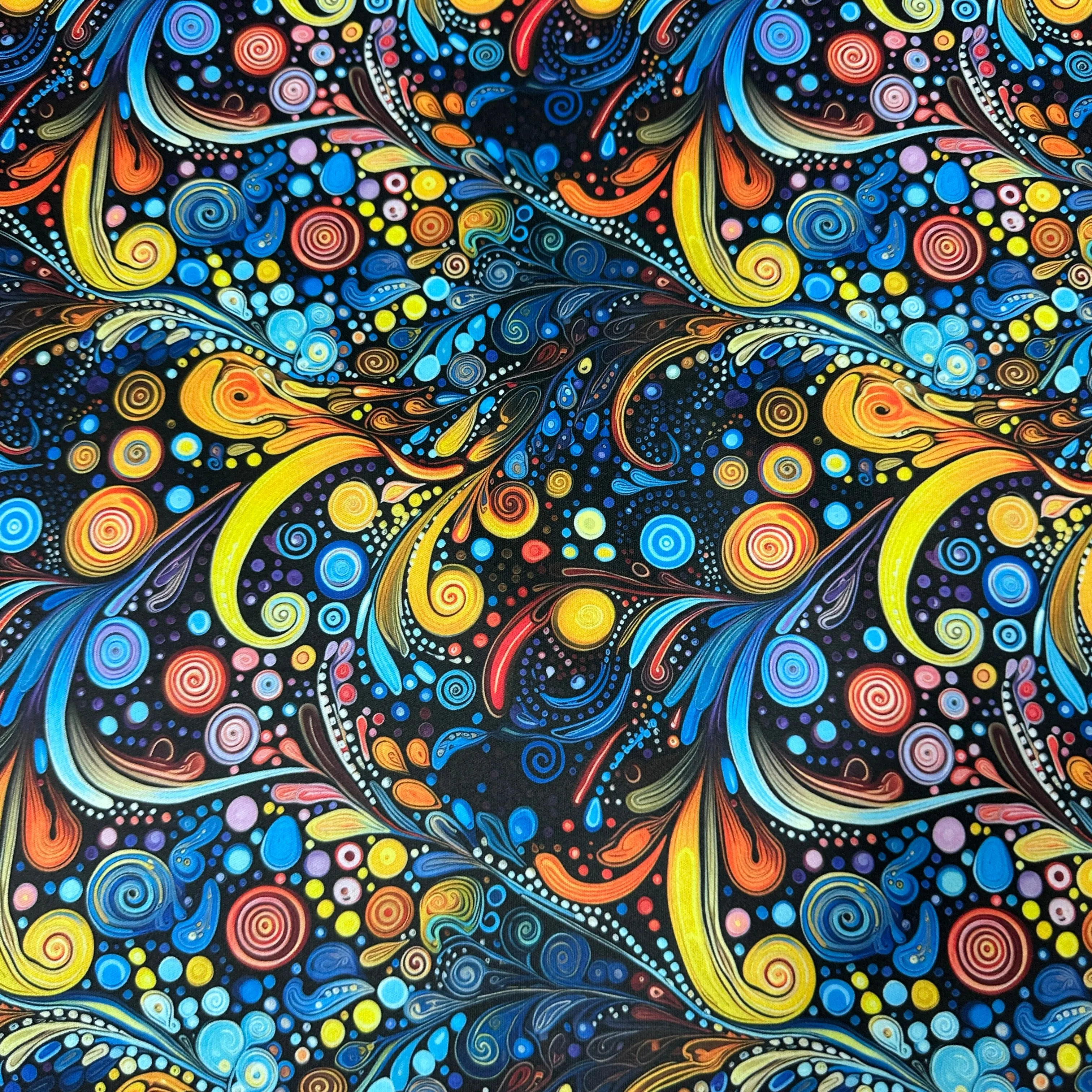 Blue, Orange and Yellow Swirls 1 mil PUL Fabric - Made in the USA