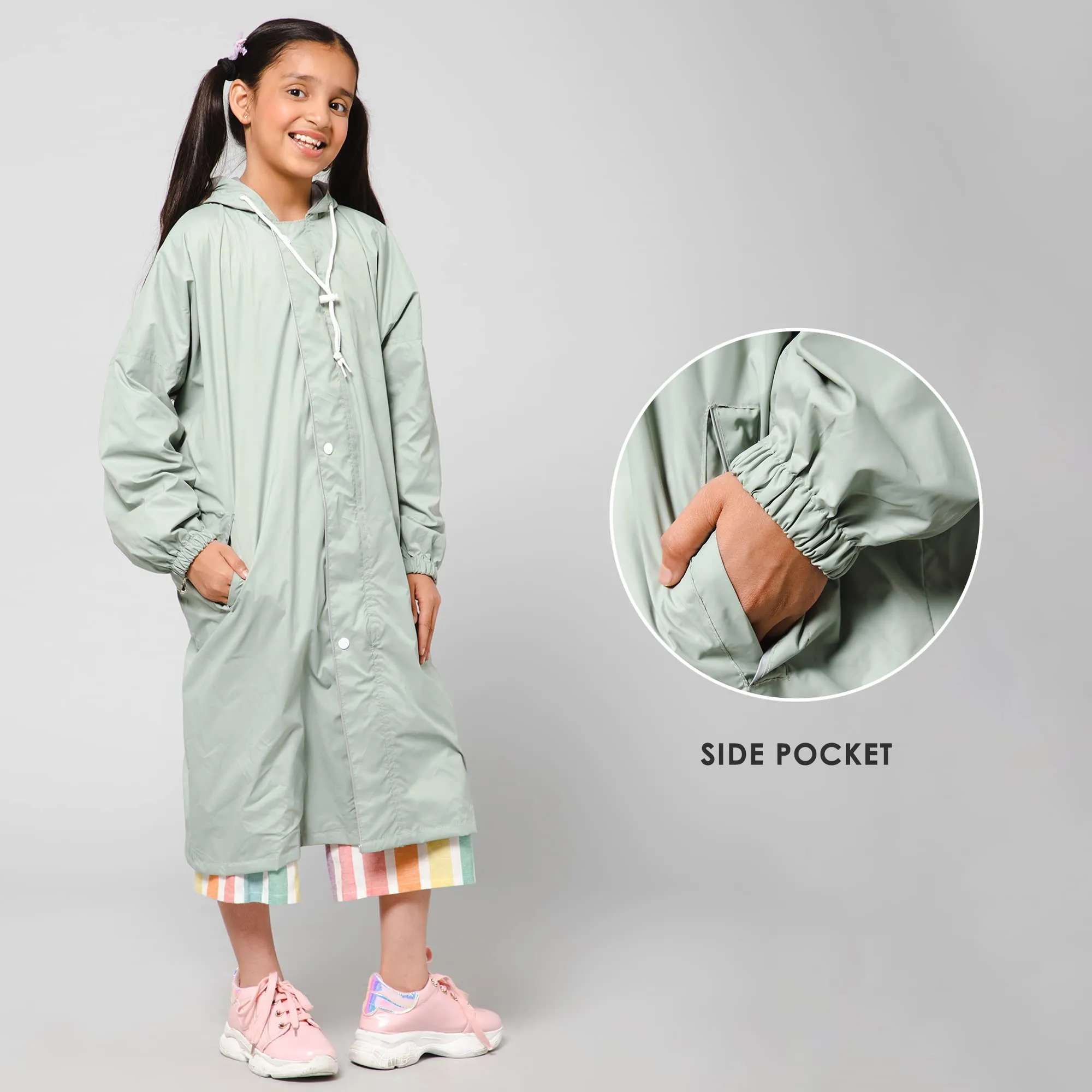 THE CLOWNFISH Cloud Chaser Series Kids Raincoat Waterproof Polyester Double Coating Reversible Longcoat with Hood and Reflector Logo at Back. Printed Plastic Pouch. Kid Age-13-14 years (Pista Green)