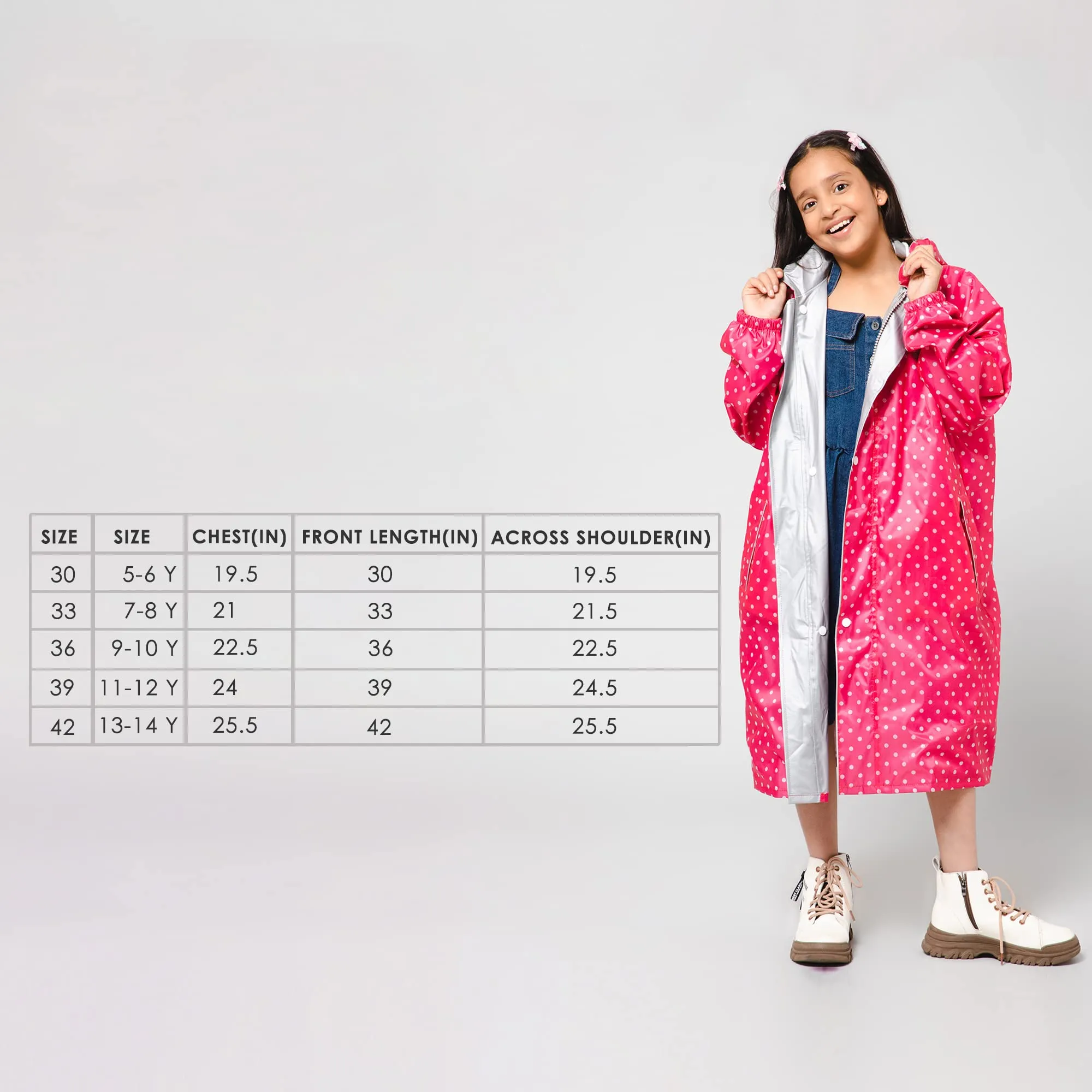 The Clownfish Drizzle Dot Series Kids Raincoat Waterproof Polyester Double Coating Reversible Longcoat with Hood and Reflector Logo at Back. Printed Plastic Pouch. Kid Age-13-14 years (Bubblegum Pink)