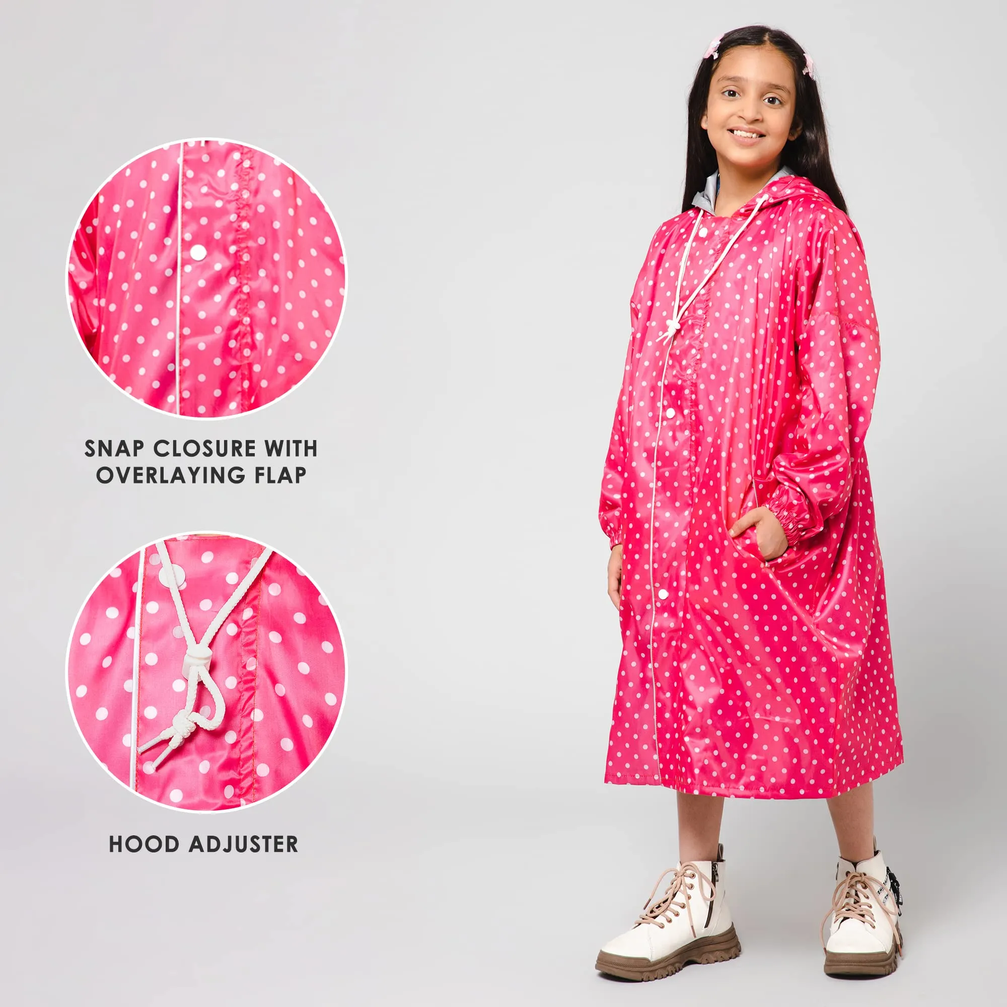 The Clownfish Drizzle Dot Series Kids Raincoat Waterproof Polyester Double Coating Reversible Longcoat with Hood and Reflector Logo at Back. Printed Plastic Pouch. Kid Age-13-14 years (Bubblegum Pink)